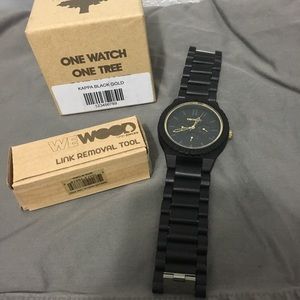 Black & gold We Wood watch with adjustable band